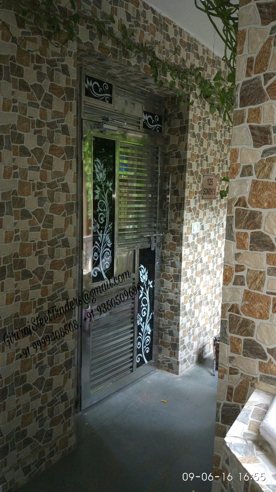 Giriraj Steel Traders stainless steel door with CNC floral panels